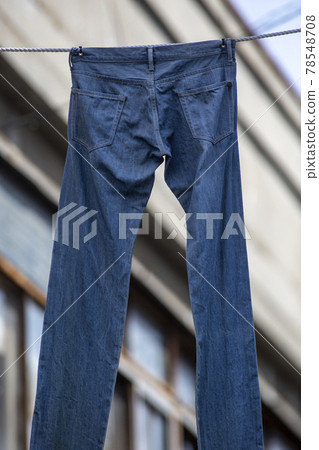 Photographing hanging jeans on Kojima Jeans Street Photographing hanging jeans on Kojima Jeans Street 78548708