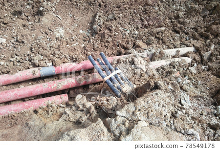 SEREMBAN, MALAYSIA -FEBRUARY 24, 2017: Underground utility and services pipe lay by workers at the construction site. SEREMBAN, MALAYSIA -FEBRUARY 24, 2017: Underground utility and services pipe lay by workers at the construction site. 78549178