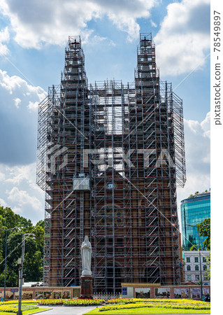 Notre Dame Basilica of Saigon during restoration covered with scaffolds Notre Dame Basilica of Saigon during restoration covered with scaffolds 78549897