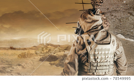 Stalker in soviet gas mask on desert wasteland background. Stalker in soviet gas mask on desert wasteland background. 78549995