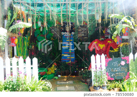 PUTRAJAYA, MALAYSIA -MAY 30, 2016: Small pocket garden made from mix of recycle material and mix of flower at Floria Garden, Putrajaya, Malaysia.    78550080