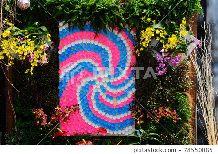 PUTRAJAYA, MALAYSIA -MAY 30, 2016: Small pocket garden made from mix of recycle material and mix of flower at Floria Garden, Putrajaya, Malaysia. PUTRAJAYA, MALAYSIA -MAY 30, 2016: Small pocket garden made from mix of recycle material and mix of flower at Floria Garden, Putrajaya, Malaysia. 78550085
