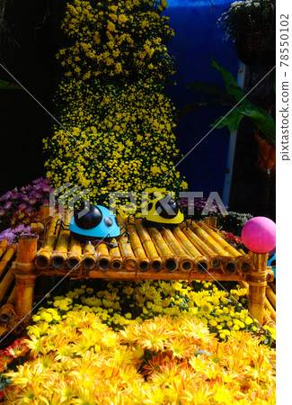 PUTRAJAYA, MALAYSIA -MAY 30, 2016: Small pocket garden made from mix of recycle material and mix of flower at Floria Garden, Putrajaya, Malaysia. PUTRAJAYA, MALAYSIA -MAY 30, 2016: Small pocket garden made from mix of recycle material and mix of flower at Floria Garden, Putrajaya, Malaysia. 78550102
