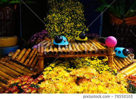 PUTRAJAYA, MALAYSIA -MAY 30, 2016: Small pocket garden made from mix of recycle material and mix of flower at Floria Garden, Putrajaya, Malaysia. PUTRAJAYA, MALAYSIA -MAY 30, 2016: Small pocket garden made from mix of recycle material and mix of flower at Floria Garden, Putrajaya, Malaysia. 78550103