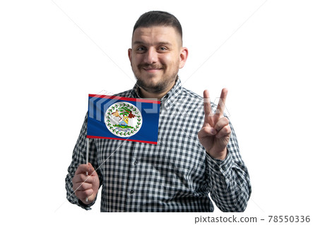 White guy holding a flag of Belize and shows two fingers isolated on a white background 78550336