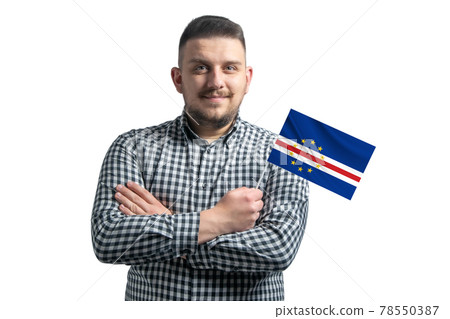 White guy holding a flag of Cape Verde smiling confident with crossed arms isolated on a white background 78550387