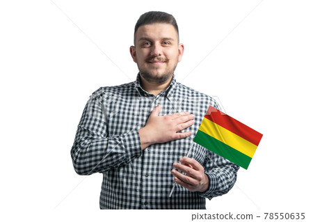 White guy holding a flag of Bolivia and holds his hand on his heart isolated on a white background With love to Bolivia White guy holding a flag of Bolivia and holds his hand on his heart isolated on a white background With love to Bolivia 78550635