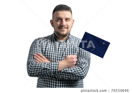 White guy holding a flag of Alaska smiling confident with crossed arms isolated on a white background White guy holding a flag of Alaska smiling confident with crossed arms isolated on a white background 78550646