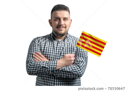 White guy holding a flag of Catalonia smiling confident with crossed arms isolated on a white background White guy holding a flag of Catalonia smiling confident with crossed arms isolated on a white background 78550647