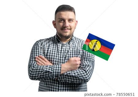 White guy holding a flag of New Caledonia smiling confident with crossed arms isolated on a white background White guy holding a flag of New Caledonia smiling confident with crossed arms isolated on a white background 78550651
