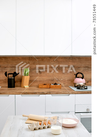 interior of kitchen and dough ingredients interior of kitchen and dough ingredients 78551449