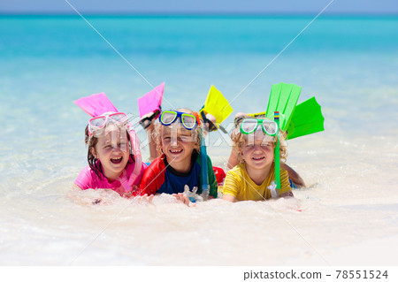 Kids snorkel. Children snorkeling in tropical sea. Kids snorkel. Children snorkeling in tropical sea. 78551524