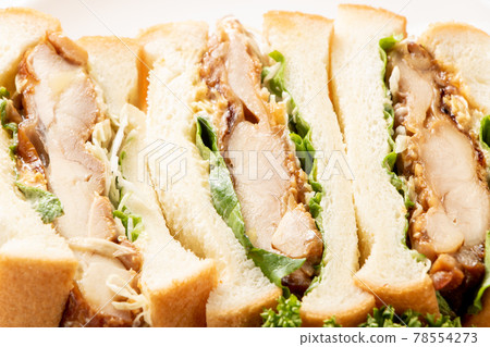 Close-up of teriyaki chicken sandwich. 78554273