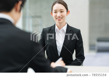 A woman speaking in a corporate interview A woman speaking in a corporate interview 78555154