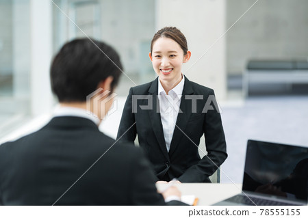 Women interviewed by a company Women interviewed by a company 78555155