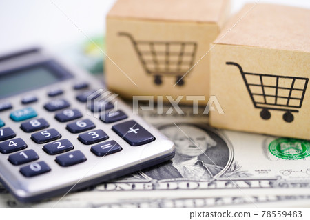 Calculator and US dollar banknotes with shopping cart box : Financial development, Accounting, Statistics, Investment Analytic research data economy office Business company banking. Calculator and US dollar banknotes with shopping cart box : Financial development, Accounting, Statistics, Investment Analytic research data economy office Business company banking. 78559483