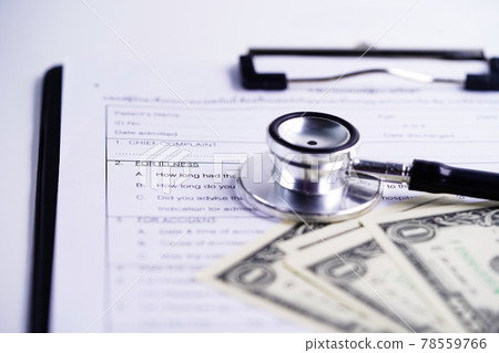 Health insurance accident claim form with stethoscope and US dollar banknotes, Medical concept. Health insurance accident claim form with stethoscope and US dollar banknotes, Medical concept. 78559766
