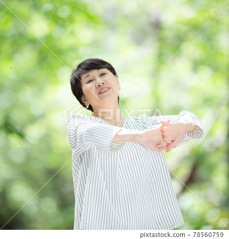 Fresh green senior woman smile stretch stretch Fresh green senior woman smile stretch stretch 78560759