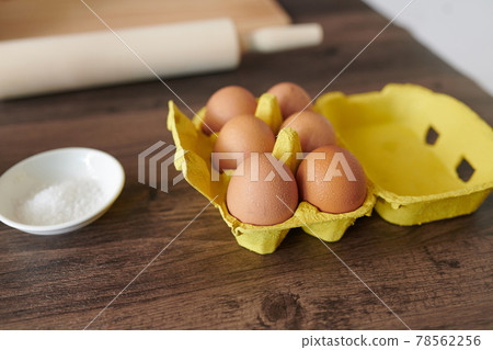 Close up shot of chicken eggs on the table Close up shot of chicken eggs on the table 78562256