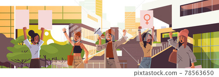 mix race activists holding placards with female gender sign feminist demonstration girl power movement rights protection women empowerment concept portrait cityscape background horizontal 78563650