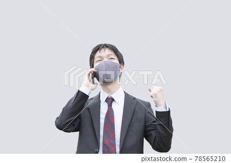 Office worker in guts pose on the phone Office worker in guts pose on the phone 78565210