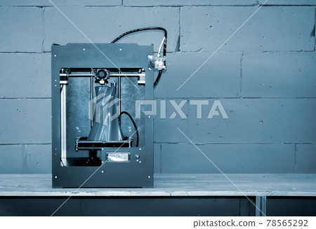 3D printer working close up. Automatic three dimensional 3d printer 3D printer working close up. Automatic three dimensional 3d printer 78565292