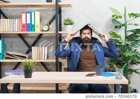 Serious businessman in formal style hold laptop computer Serious businessman in formal style hold laptop computer 78566379