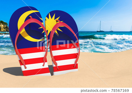 Flip flops with Malaysian flag on the beach. Malaysia resorts, vacation, tours, travel packages concept. 3D rendering Flip flops with Malaysian flag on the beach. Malaysia resorts, vacation, tours, travel packages concept. 3D rendering 78567169