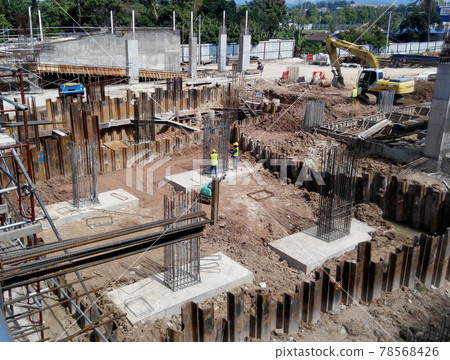 SELANGOR, MALAYSIA -JULY 14, 2016: The concrete pile cap concreted at the construction site in Selangor Malaysia. The pile cap is the part of building foundation. SELANGOR, MALAYSIA -JULY 14, 2016: The concrete pile cap concreted at the construction site in Selangor Malaysia. The pile cap is the part of building foundation. 78568426