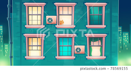 Building facade with windows at night 78569155