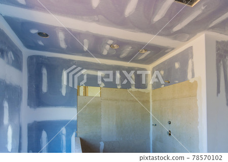 Renovation construction of master bathroom with new under construction bathroom interior drywall Renovation construction of master bathroom with new under construction bathroom interior drywall 78570102