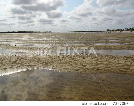Betania Village: Wet sandy beach after the tide (Madagascar Morondava) Betania Village: Wet sandy beach after the tide (Madagascar Morondava) 78570624