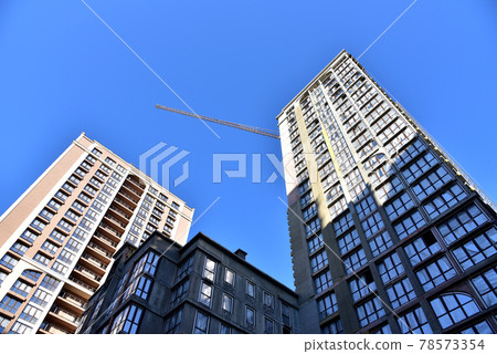 Facade of a new modern building. Facade of a new modern building. 78573354
