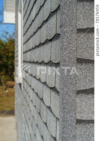 Shingles texture - close up view of asphalt roofing shingles Shingles texture - close up view of asphalt roofing shingles 78576959