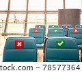 social distancing seats at airport's gate 78577364