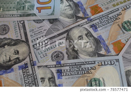 US one hundred dollar bills background.  78577471