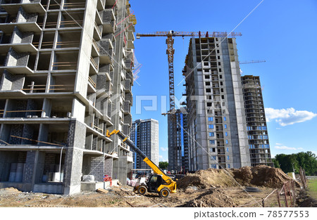 Telescopic handler work at the construction site.  78577553