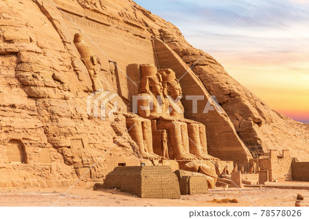 Abu Simbel, Egypt, view of the Great Temple's colossal statues, sunset light 78578026