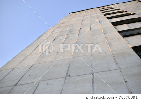 The surface and walls of a yellow high residential building The surface and walls of a yellow high residential building 78578391