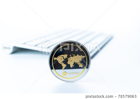 Monero wallet. Golden Bit Coin virtual cryptocurrency or blockchain technology. Gold Crypto currency BTC with keyboard on white background. Investing in virtual assets, Bull market trend concept. Monero wallet. Golden Bit Coin virtual cryptocurrency or blockchain technology. Gold Crypto currency BTC with keyboard on white background. Investing in virtual assets, Bull market trend concept. 78579063