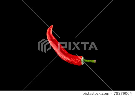 Red hot peppers. Spicy chile cayenne pepper isolated. Red hot chili paprika on black background. Fresh spice vegetable concept. Red hot peppers. Spicy chile cayenne pepper isolated. Red hot chili paprika on black background. Fresh spice vegetable concept. 78579064