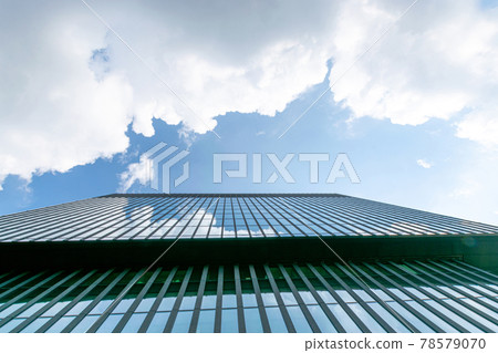 Companies buildings. Finance corporate architecture city in abstract blue sky with nature cloud in sunny day. Modern office business building with glass, steel facade exterior. Companies buildings. Finance corporate architecture city in abstract blue sky with nature cloud in sunny day. Modern office business building with glass, steel facade exterior. 78579070