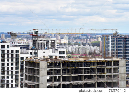 Tower crane during construction of a residential building. 78579442