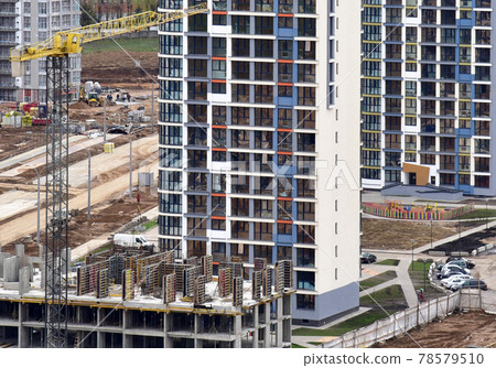 Tower crane during construction of a residential building. Tower crane during construction of a residential building. 78579510