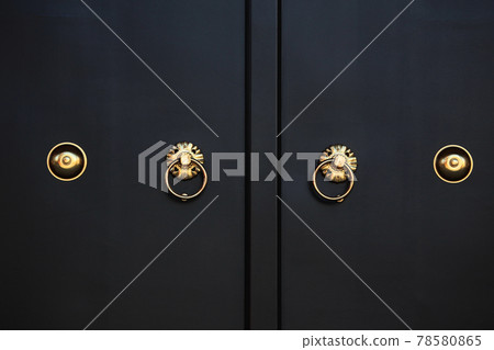 Decorative clasps and door knockers at the entrance to the Five-Story Pagoda in Sensoji Temple, Tokyo Decorative clasps and door knockers at the entrance to the Five-Story Pagoda in Sensoji Temple, Tokyo 78580865