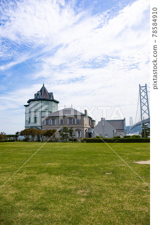 Sonbun Memorial Hall and Akashi Kaikyo Bridge in Kobe Maiko Park in summer, Awaji Island in the distance 78584910