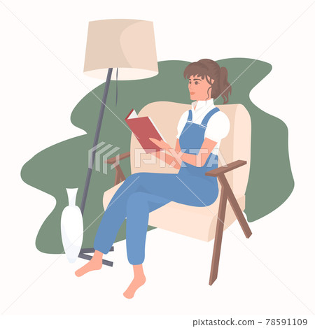 beautiful girl reading book while sitting on chair coronavirus pandemic quarantine stay home 78591109