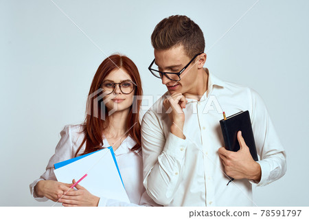 business man and woman secretary documents employees colleagues on light background cropped view business man and woman secretary documents employees colleagues on light background cropped view 78591797