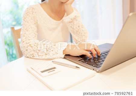 Personal computer, laptop, keyboard, typing, telework, remote work, home work, female 78592761
