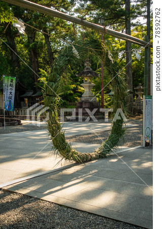 This is a view of the grounds and the straw circle that is passed through during the summer purification ritual at Taga Taisha Shrine in Shiga Prefecture. This is a view of the grounds and the straw circle that is passed through during the summer purification ritual at Taga Taisha Shrine in Shiga Prefecture. 78592762